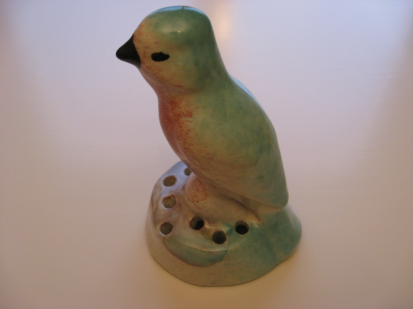 Blomster spreder fugl - Thorvald Olsen - Olsen Keramikk